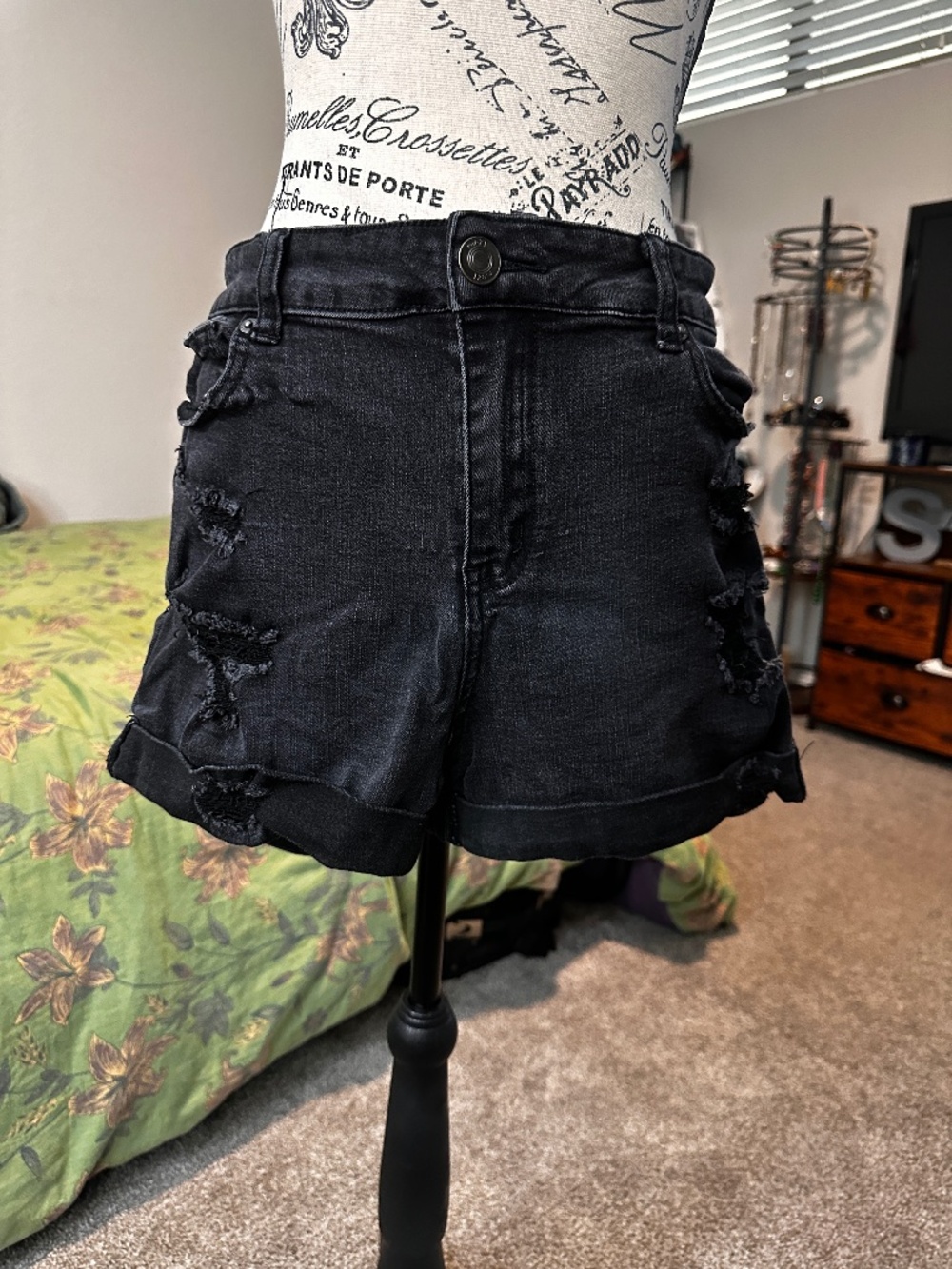 Rue21 Black denim shorts with distressed details.